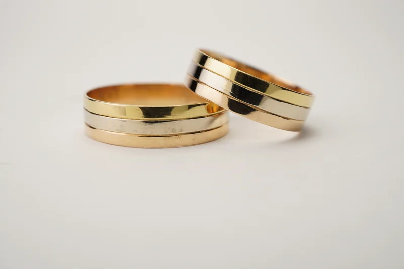 Alianzas de oro 18 kt modelo Comb/3 col cinta