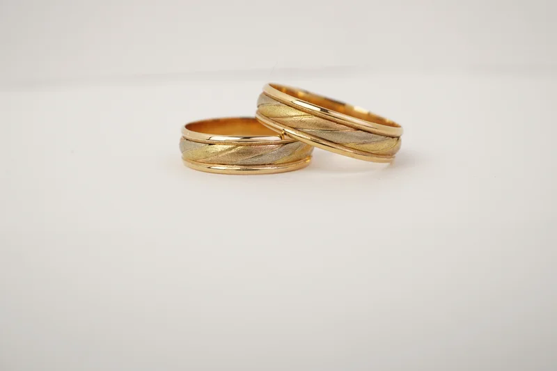 Alianzas de oro 18 kt modelo Ital trenza 3 col